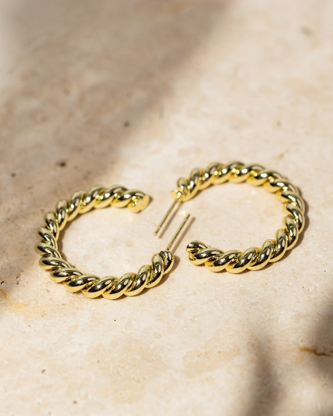 BOLD TWISTED HOOP EARRINGS