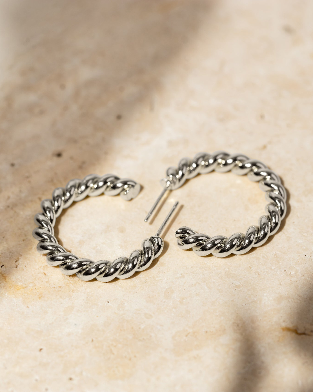 BOLD TWISTED HOOP EARRINGS