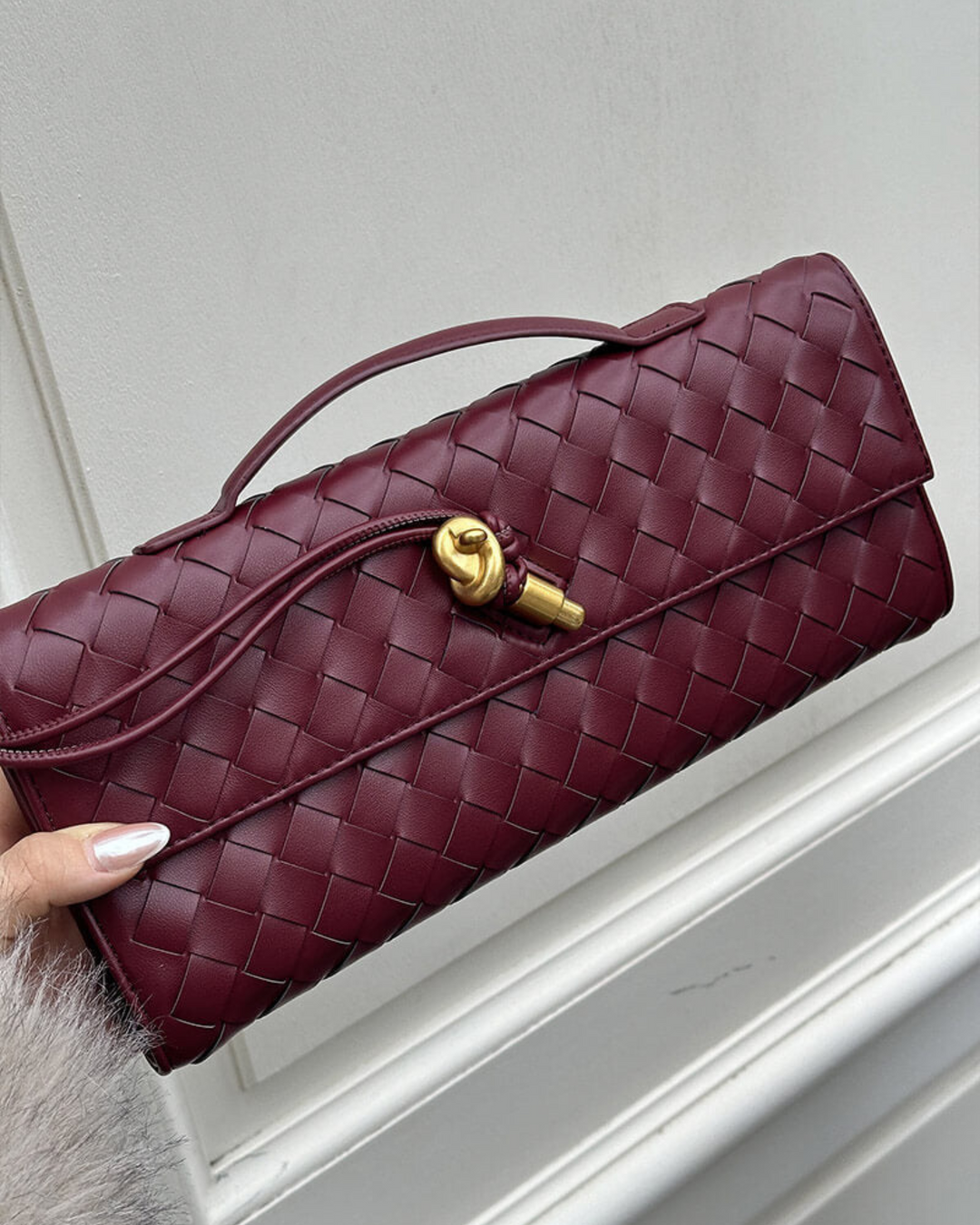 ELEGANTE GEFLOCHTENE KLAPPE KUPPLUNG